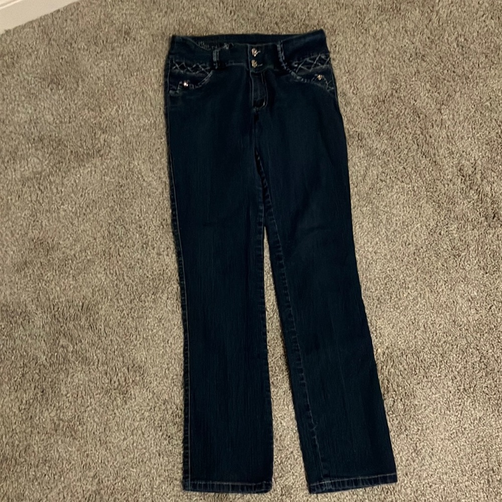 Two pairs of jeans.Both are brand new with no tags.Have cool designs aswell.